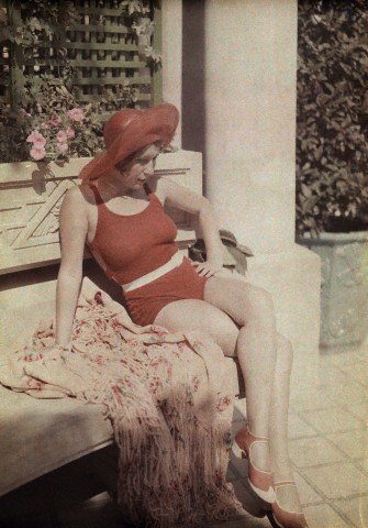 File:1936 Bd. Take Ionescu 1936 - A woman wearing a red bathing suit and hat sits on a bench (Bucharest).jpg